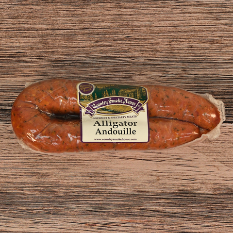 Packaged Alligator Andouille on a wooden surface