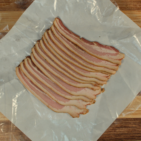 One pound of maple smoked bacon on butcher paper