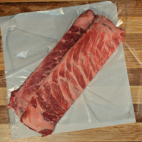 Two Slabs of St Louis Ribs on butcher paper