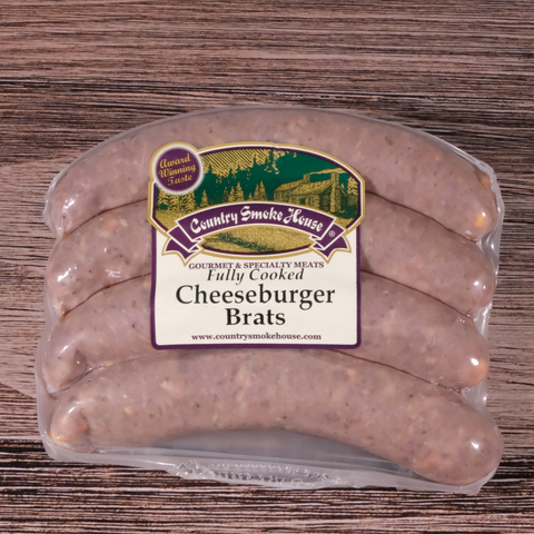 Packaged Cheeseburger Brats on a wooden surface.