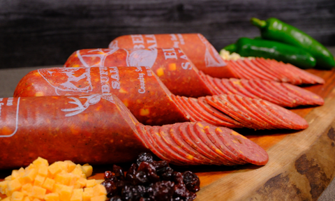 Sliced Country Smoke House Salami Chubs with ingredients.