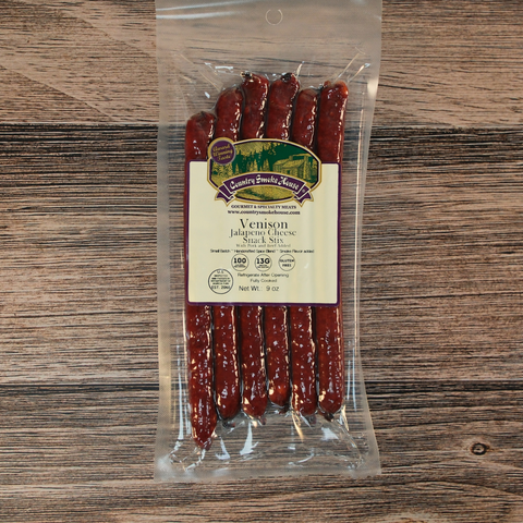 Packaged Venison jalapeno cheese snack Sticks on a wooden surface