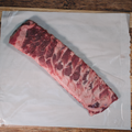 One slab of St Louis Ribs on butcher paper