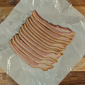 One pound of maple smoked bacon on butcher paper