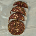 Four Mushroom and Swiss Burger Patties on butcher paper