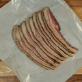 One pound of peppered bacon on butcher paper