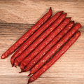Buffalo Cheddar Cheese Snack Stix on a wooden surface
