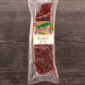 Packaged Buffalo Jerky with a label on a wooden surface