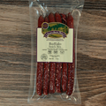 Packaged Buffalo Snack Stix with a label on a wooden surface