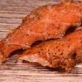  Caribbean Jerk Turkey Jerky on a wooden surface