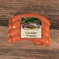 Packaged Cheddar Viennas on a wooden surface