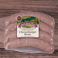 Packaged Cheeseburger Brats on a wooden surface.