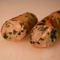 Close up of sliced Spinach Feta Chicken Brat 