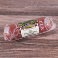 Packaged Elk Jalapeno Pepper Salami Chub on a wooden surface.