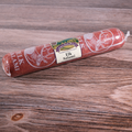A packaged Elk Long Salami placed on a wooden surface.