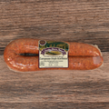 Packaged European Style Kielbasa on a wooden surface