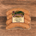 Packaged Fajita Pork Brats on a wooden surface