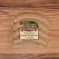 Packaged Garlic Parmesan Pork Brats on a wooden surface