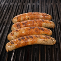Garlic and Parmesan Brats on the grill.