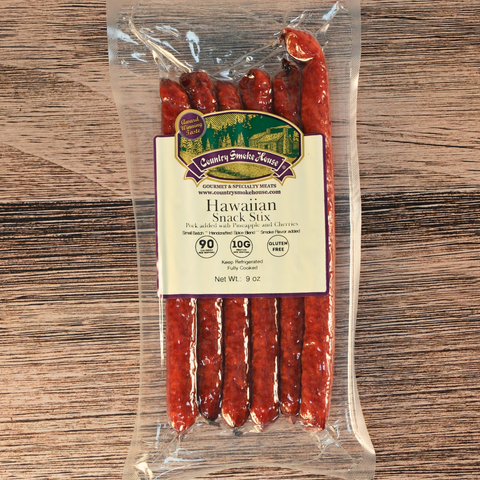 Packaged Hawaiian snack sticks with a label on a wooden surface