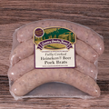 Packaged Heineken® Beer Brats on a wooden surface