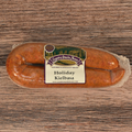 Packaged Holiday Kielbasa on a wooden surface