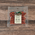 Packaged Hunters Sausage on a wooden surface