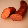 Close-up of a sliced Cheddar Jalapeno Brats