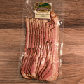 Packaged Premium Sugar Cured Peppered Smoked Bacon on a wooden surface
