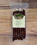 Pheasant Cherry Cheddar Snack Stix on a wooden background.