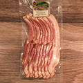 Packaged Premium Sugar Cured Maple Bacon on a wooden surface