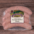 Packaged Russian Reuben Brats on a wooden surface.