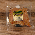 Packaged Southern Style Shredded Beef Brisket on a wooden surface