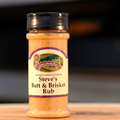 A bottle of Steve's Butt and Brisket Rub on a wooden surface