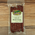 Packaged Uncured Buffalo Mild Snack Stix on a wooden surface