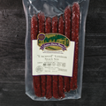 Packaged Uncured Venison Mild Snack Stix on a wooden background