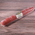 A packaged Venison Cheddar Cheese Long Salami on a wooden surface.
