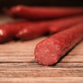 Sliced Venison Mild Snack Stick with spices and texture