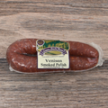 Packaged Venison Polish Kielbasa on a wooden surface