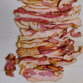 Wayside bacon on a white surface