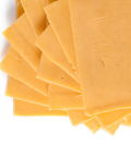 A stack of thick, golden-yellow cheese slices fanned out on a clean white background.